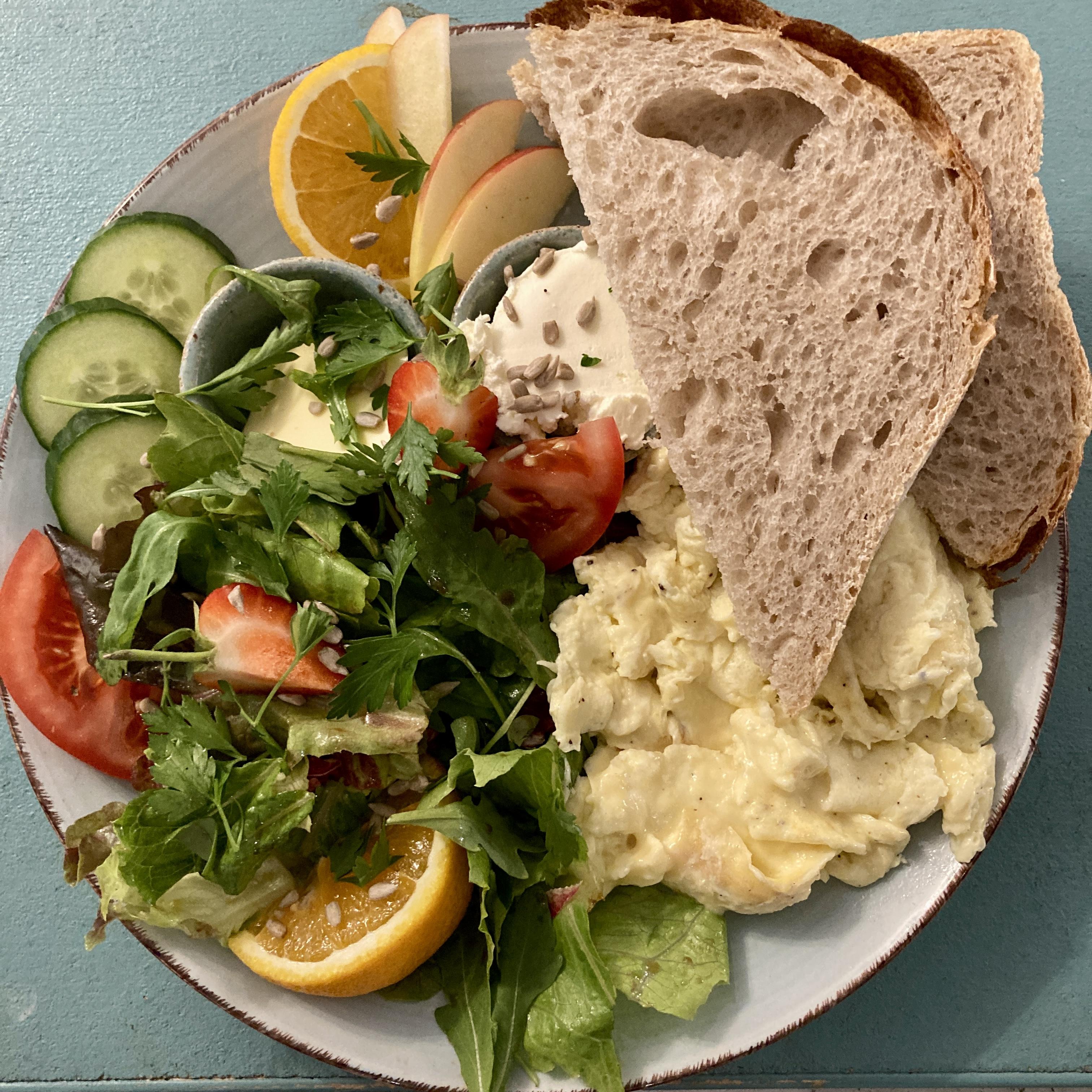 Shared brunch and breakfast food at Café Alma