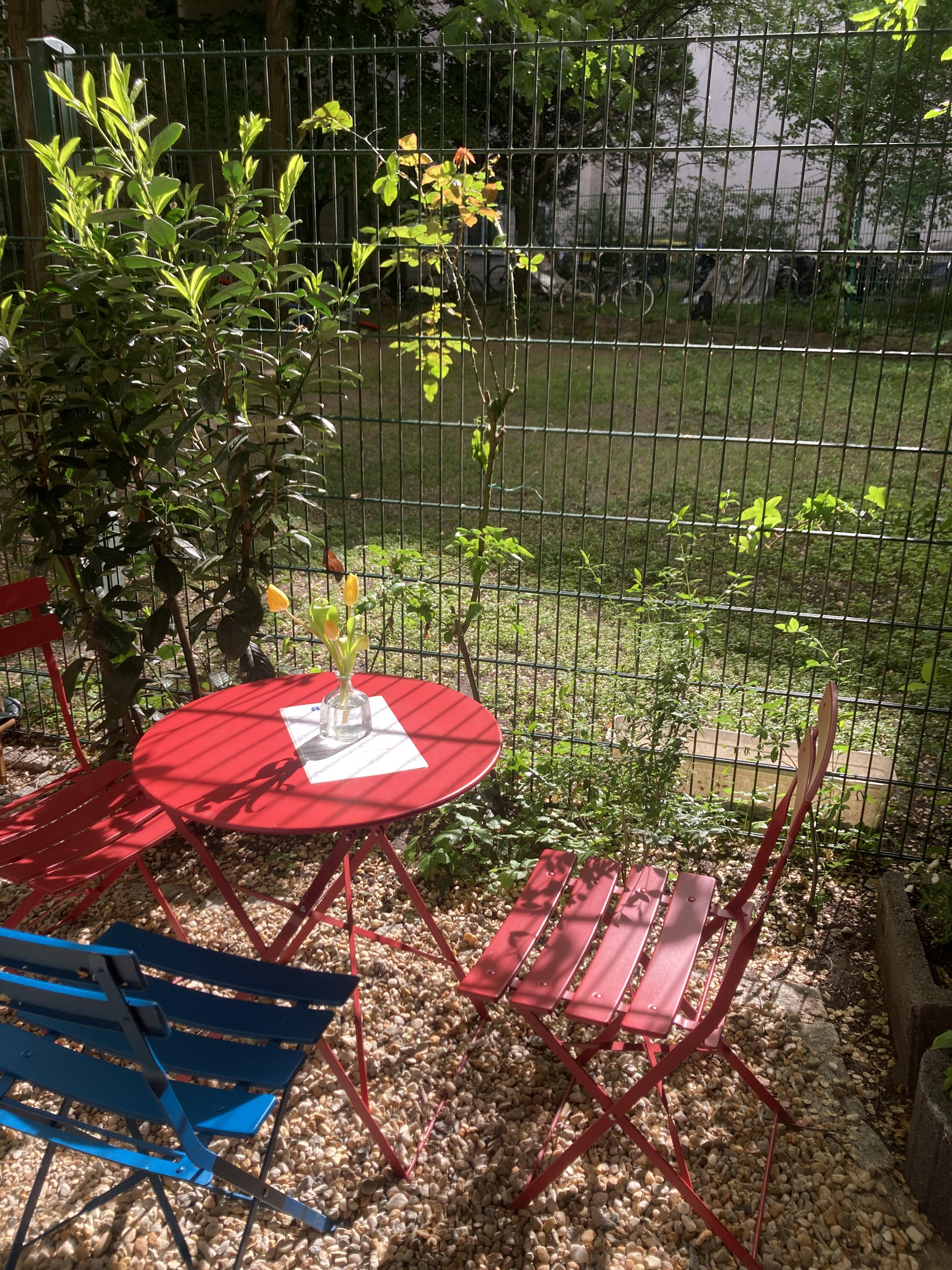 Outdoor cafe garden table at Café Alma Berlin